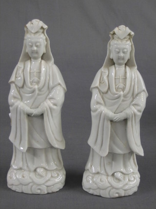 A pair of 19th Century Oriental blanc de chine porcelain figures of Quang Lis 9"