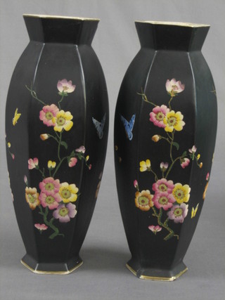 A pair of H & S black glazed octagonal vases with floral decoration 12" (1 chipped to rim)