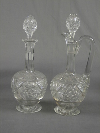 A cut glass claret jug raised on a circular base and a cut glass club shaped decanter with stopper 11"