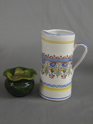 A faience pottery jug 9" and a green glazed Bretby jardiniere 5"
