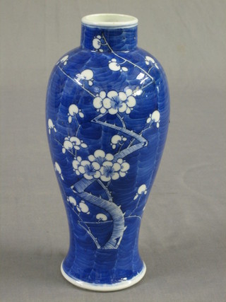 An Oriental prunus pattern vase 11"