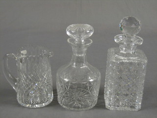 A square cut glass decanter, a club shaped decanter and a cut glass jug 6"