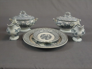A 19th Century blue and white bamboo pattern oval meat plate 13 1/2", 2 sauce tureens and covers and 2 sauce boats (1 with chip to base)