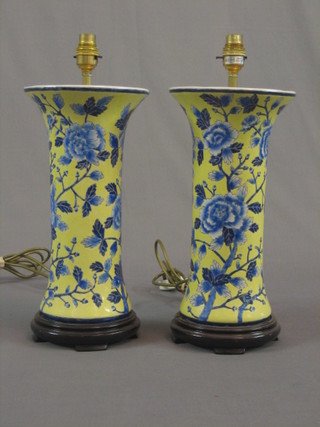 A pair of waisted Oriental style yellow glazed and floral patterned table lamps 14 1/2"