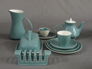 A collection of various Poole Pottery blue tea ware