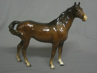 A Beswick figure of a bay horse (1 back and 1 front leg f and r) 9"