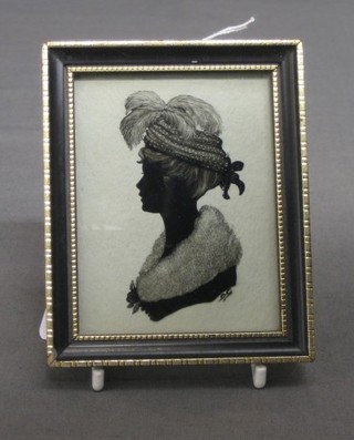 A 19th Century silhouette of a bonnetted lady 3" x  2 1/2" monogrammed DG 