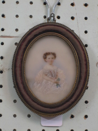 A portrait miniature on ivory panel of a seated young girl 3 1/2"