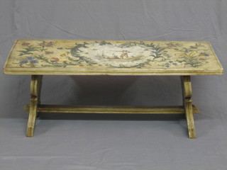A 19th/20th Century rectangular Continental pine trestle table, the top painted a shooting scene within floral garland 4"
