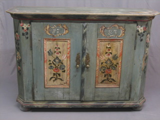A 19th Century Continental lozenge shaped painted pine cabinet, enclosed by panelled door, marked 1783 59"