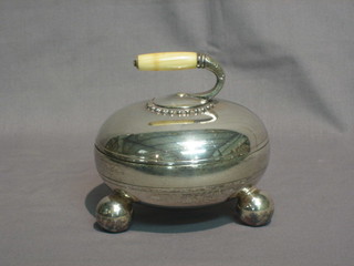 An Edwardian silver plated preserve dish in the form of a curling stone, raised on 3 bun feet 5"