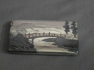 An Oriental silver card case with Niello decoration decorated a bridge with stream 2 ozs