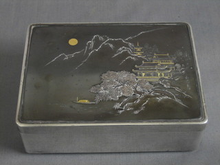 An Oriental silver cigarette box, the lid with Niello decoration, approx 20 ozs