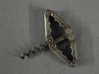 A 19th Century German polished steel folding pocket corkscrew, marked Patent applied for Patent Angemeldet Made in Germany, 3"