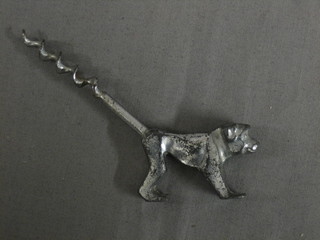A 1930's novelty corkscrew in the form of a dog 5" overall