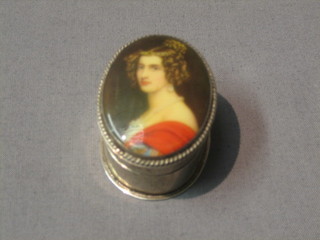 A modern white metal and "enamelled" pill box of oval form 2"
