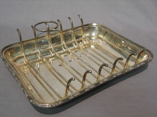 A silver plated asparagus tray