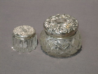 2 circular cut glass dressing table jars with silver lids 1"