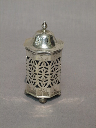 An Edwardian octagonal pierced silver pepper, Chester 1905