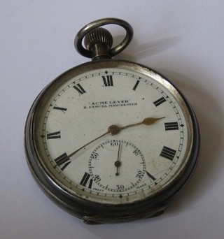 An open faced pocket watch contained in a silver case