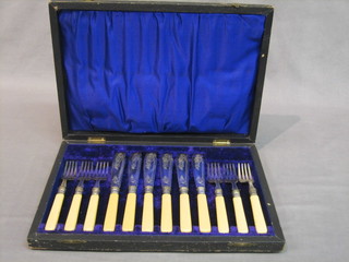 A set of 6 silver plate fish knives and forks, cased