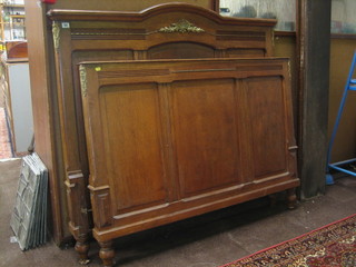A 19th/20th Century French honey oak double bedstead 54"