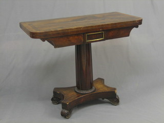 A William IV mahogany D shaped card table with crossbanded top, raised on a turned column with triform base (top and column split) 35"