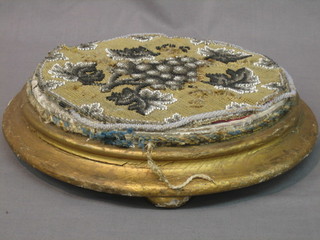 A Victorian circular gilt painted footstool with bead work seat, 12"