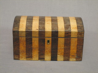A rosewood and mahogany striped dome shaped tea caddy 8"