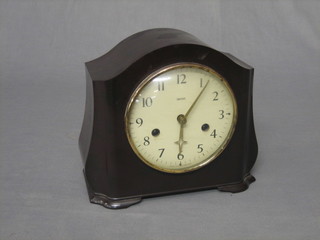 A 1930's Smith's 8 day striking mantel clock with paper dial and Arabic numerals contained in a Bakelite case
