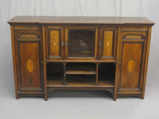 An Edwardian inlaid rosewood breakfront chiffonier base, enclosed by panelled doors, the base fitted recesses 60" (locked at time of cataloguing)