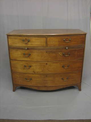 A handsome Georgian mahogany bow front chest of 2  short drawers above a brushing slide and 3 long drawers with brass swan neck drop handles, raised on splayed bracket feet 52"