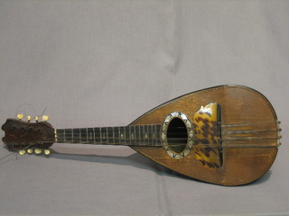 A mandolin marked Stl Jerome Thibouvllelz MA Paris