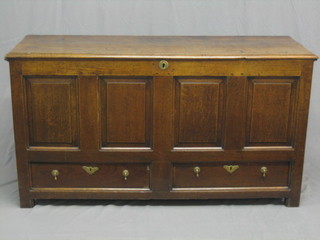 A 17th/18th Century elm mule chest of panelled construction, the base fitted 2 drawers 59", top loose,