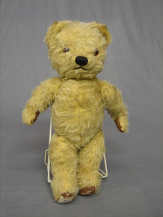 A yellow Merrythorpe teddybear with articulated limbs 14"