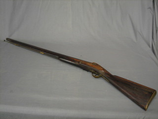 An 18th Century flintlock musket with Tower lock and 37" barrel complete with ram rod, the butt marked 666
