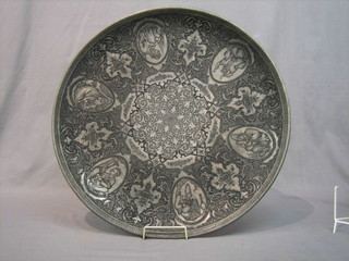 A 20th Century Eastern engraved charger decorated figures 23"