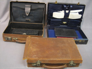 A collection of leather stationery boxes and folders etc