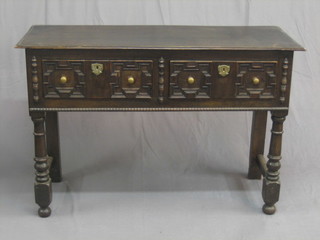 A Victorian Jacobean style oak dresser base, fitted 2 long drawer and raised on turned and block supports 47"