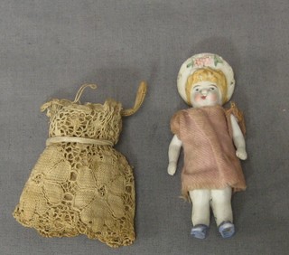 A 19th Century porcelain doll 2"