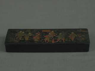 A rectangular lacquered pencil box with hinged lid and Oriental decoration 8"