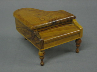 An olive wood musical box in the form of a grand piano 7"