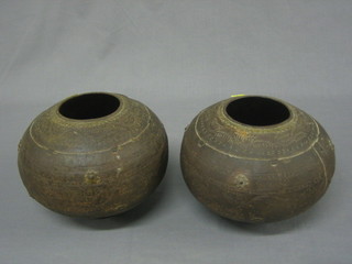 A pair of Eastern engraved steel vases 8"
