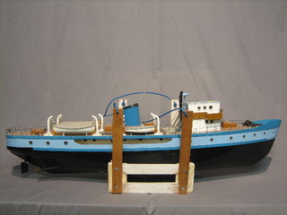 An operational wooden model of a boat 42"