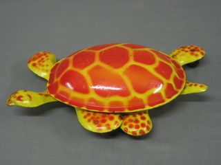 A pressed metal toy The Mobo tortoise 12"