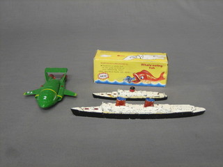 A Triang model of SS United States M704, a ditto. RMS Saxonia M708, a 1992 Matchbox Thunderbird toy together with a mechanical whale eating fish