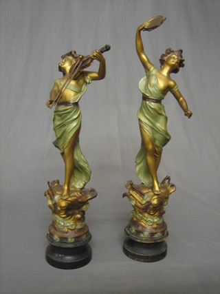 A pair of 1930's Art Deco painted spelter figures of lady musicians 22" (1f)