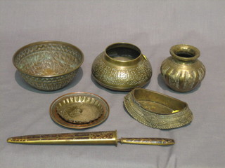 A circular embossed Eastern brass bowl 5", do. vase, a boat shaped dish 4" and 3 other items of Eastern brassware