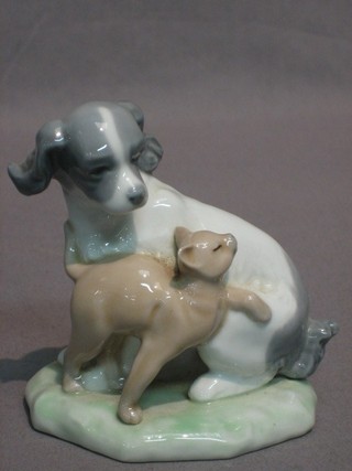 A Nao figure of a seated dog and cat 4", the base marked Nao