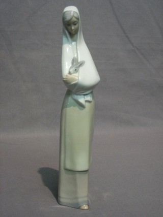 A Nao figure of a standing lady with rabbit, base impressed Nao 11"
